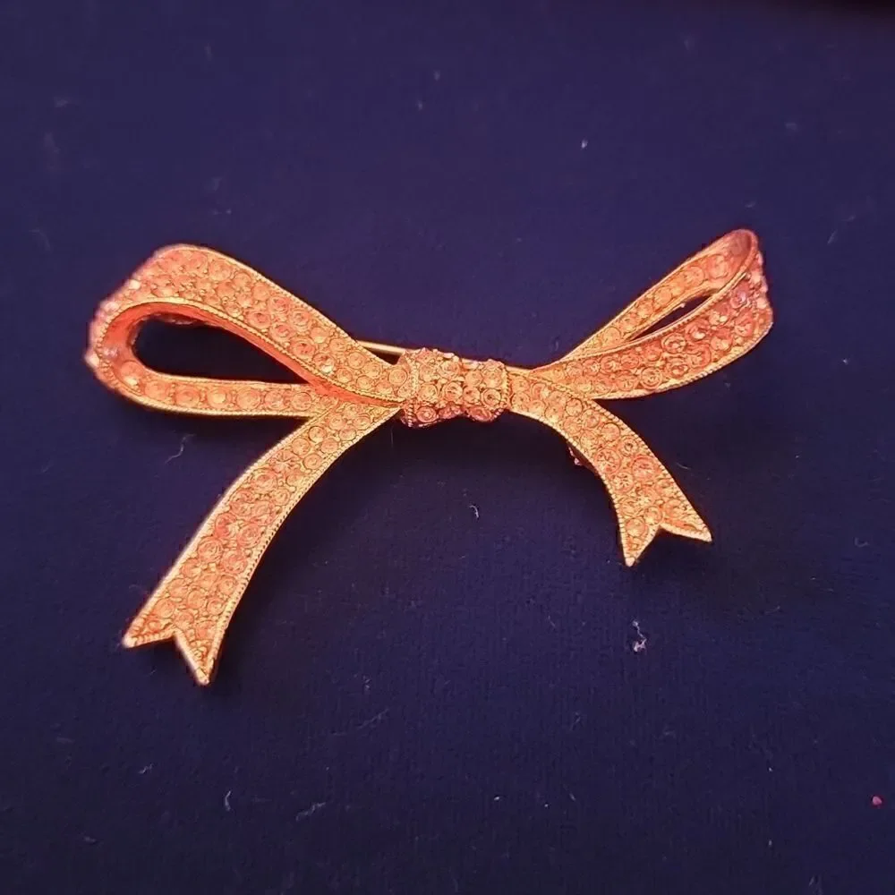 Kenneth Jay Lane Pink Rhinestone and Rose Gold Tone Ribbon Bow Brooch Pin